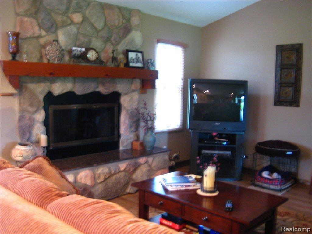37327 Judd Road New Boston, MI 48164 - Photo 2 of 4 living rm w f/p