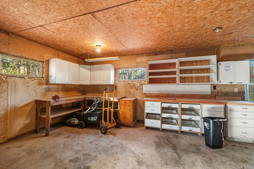 1421 Janis Road Cloquet, MN 55720 - Photo 35 of 52 Below grade area with a workshop area