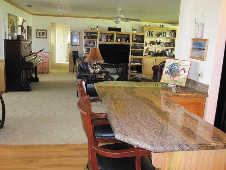 43763 McArthur Road Fall River Mills, CA 96028 - Photo 31 of 46 a dining room with furniture and wooden floor