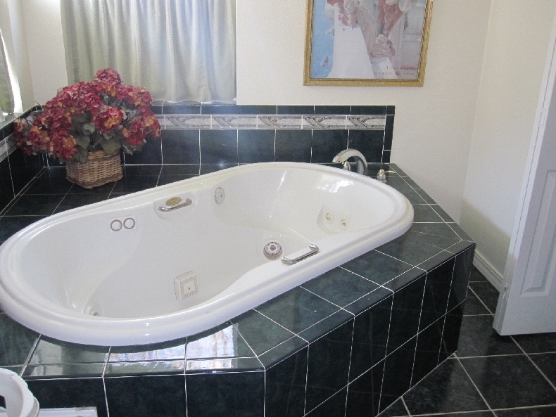 43763 McArthur Road Fall River Mills, CA 96028 - Photo 42 of 46 a bath tub sitting next to a sink