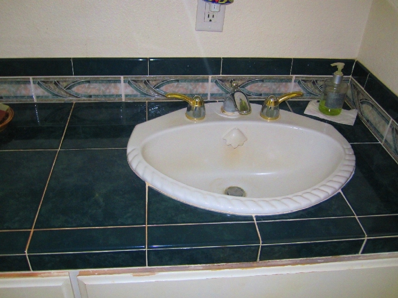43763 McArthur Road Fall River Mills, CA 96028 - Photo 44 of 46 a bathroom with a sink and mirror