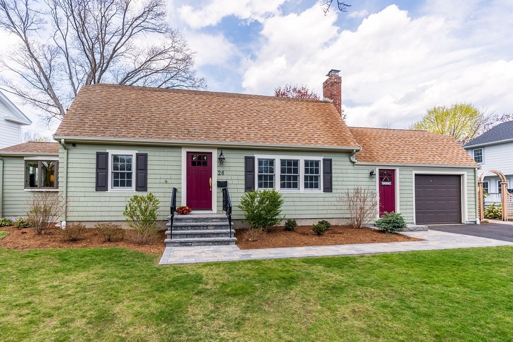 a house view with a garden space