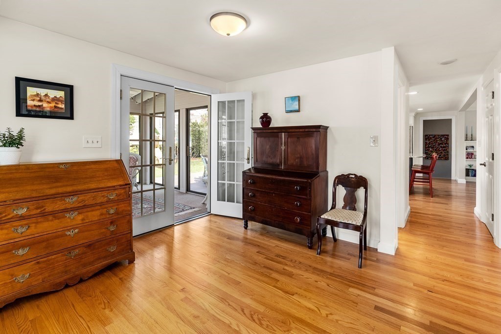 26 Cherokee Road Arlington, MA 02474 - Photo 17 of 40 a living room with furniture and a wooden floor