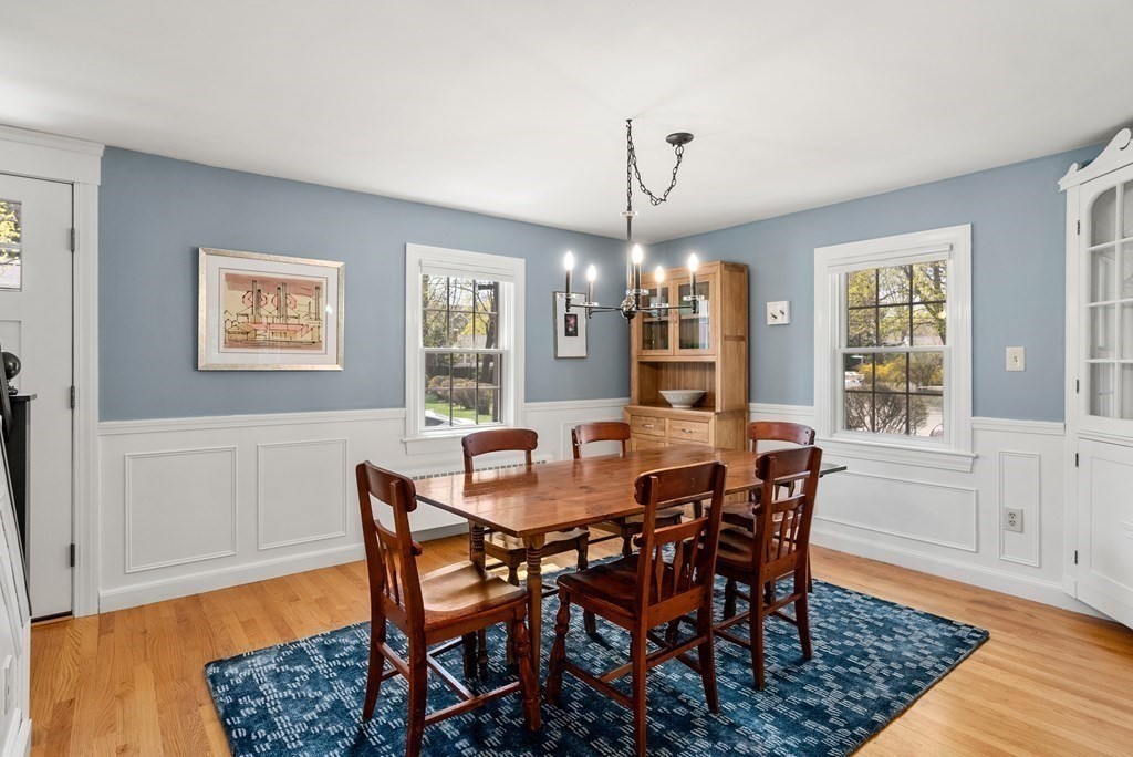 26 Cherokee Road Arlington, MA 02474 - Photo 19 of 40 a view of a dining room with furniture window and wooden floor
