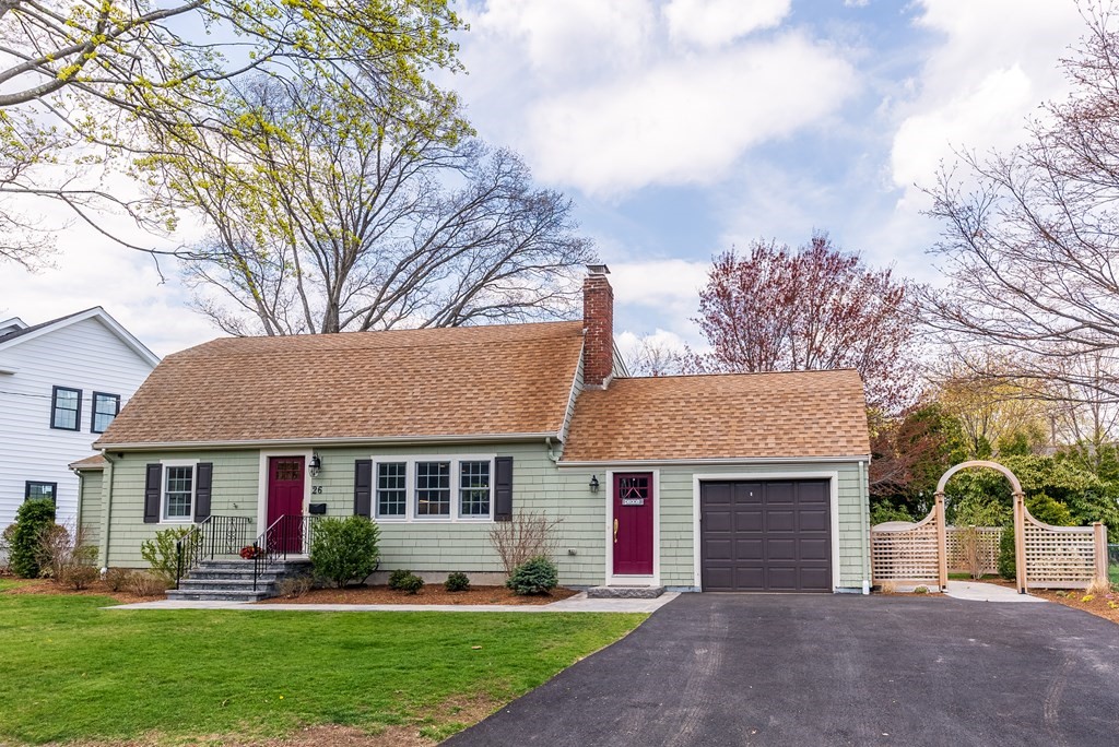 26 Cherokee Road Arlington, MA 02474 - Photo 2 of 40 a front view of a house with garden