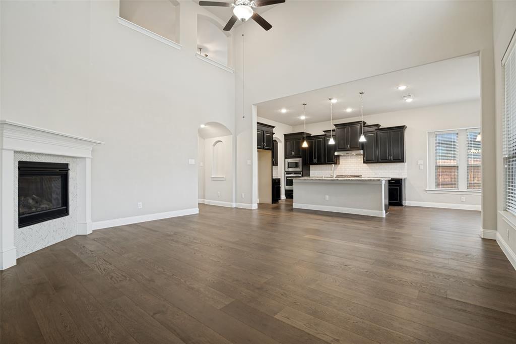 2802 Merlot Circle Rowlett, TX 75088 - Photo 8 of 40 a view of kitchen with furniture and wooden floor
