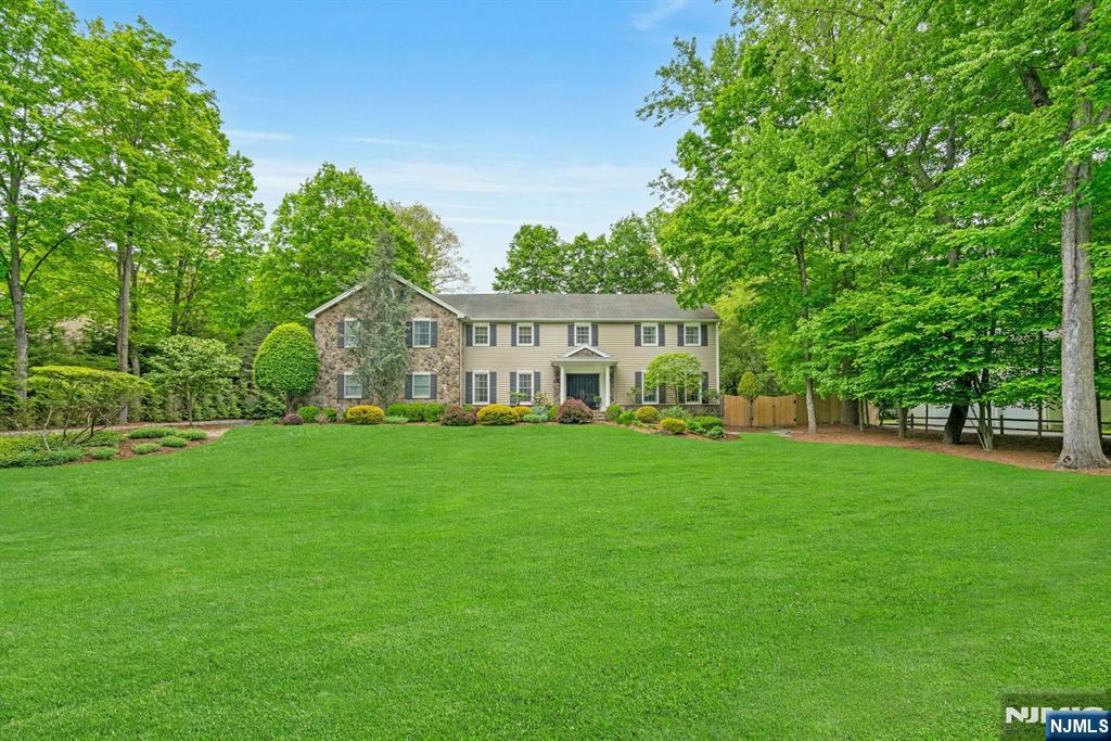 48 Hopper Farm Road Upper Saddle River, NJ 07458 - Photo 2 of 43 a view of a house with backyard and garden