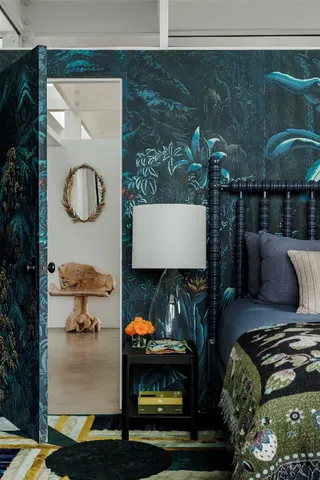 a backyard of a house with lots of green space and lake view