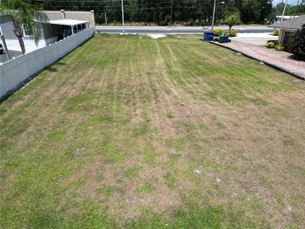 Dundee Road Dundee, FL 33838 - Photo 4 of 8 a view of a swimming pool with a yard