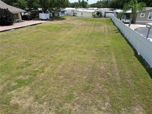 a view of swimming pool with outdoor seating