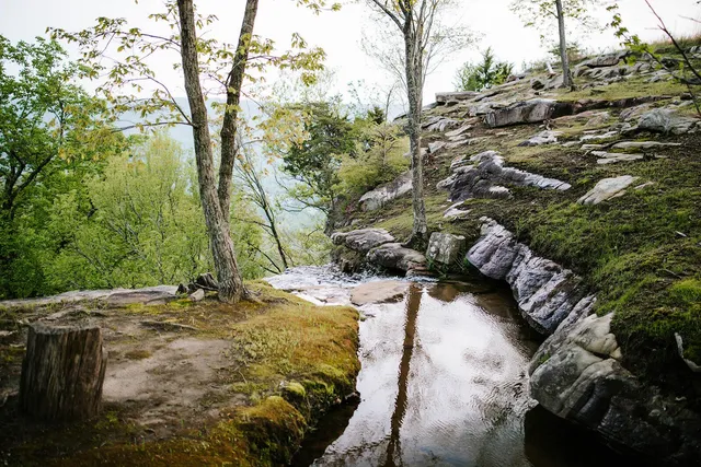 a view of a golf course with a lake