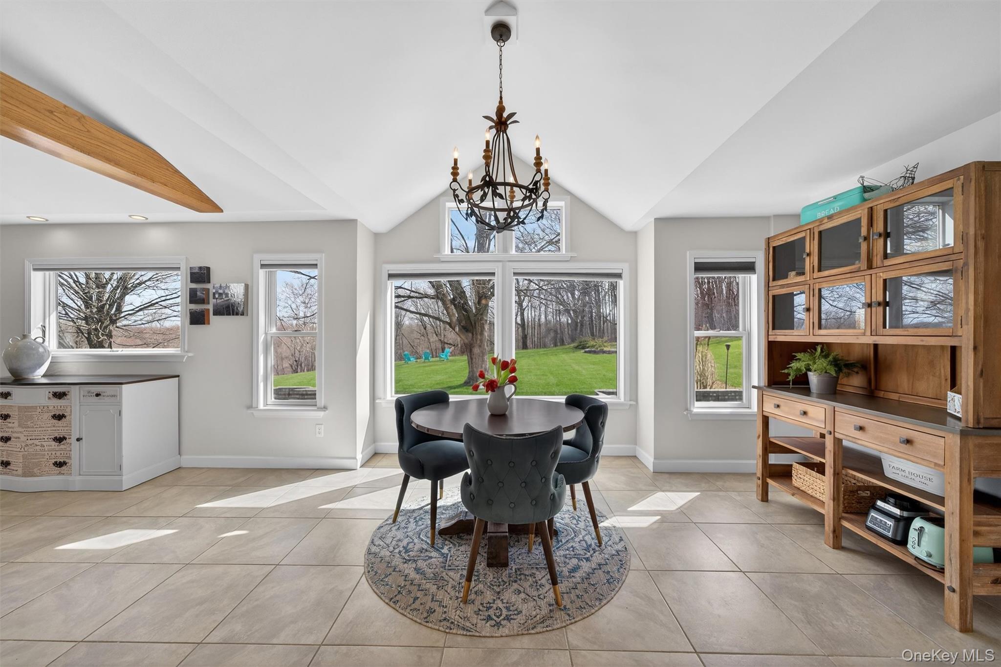 729 Mullock Road Port Jervis, NY 12771 - Photo 20 of 50 a dining room with furniture and a window