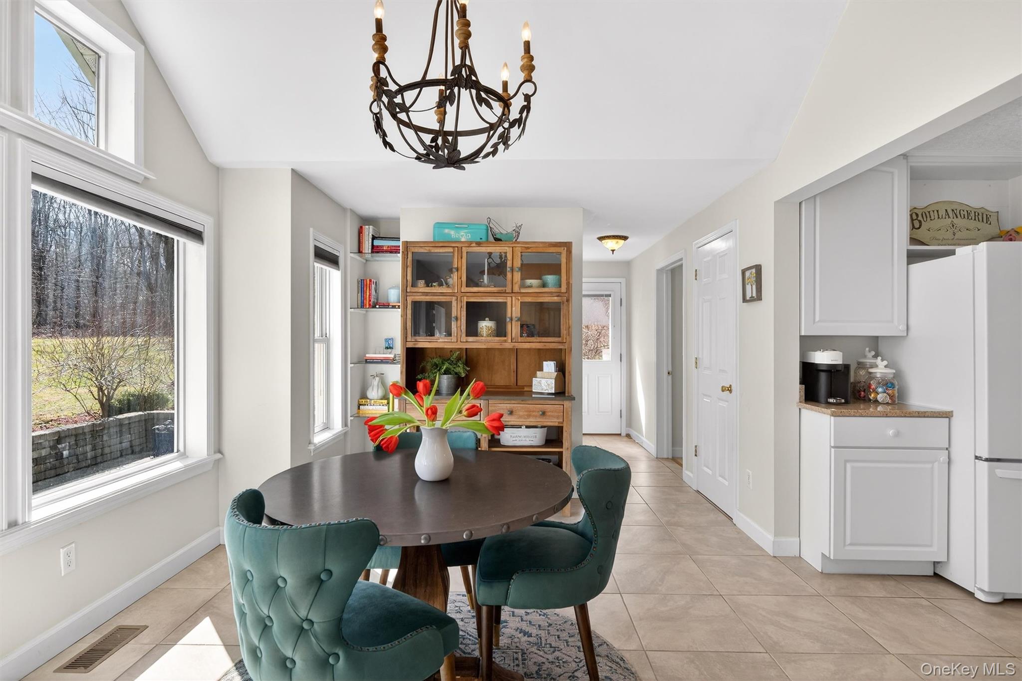 729 Mullock Road Port Jervis, NY 12771 - Photo 26 of 50 a view of a dining room with furniture window and wooden floor