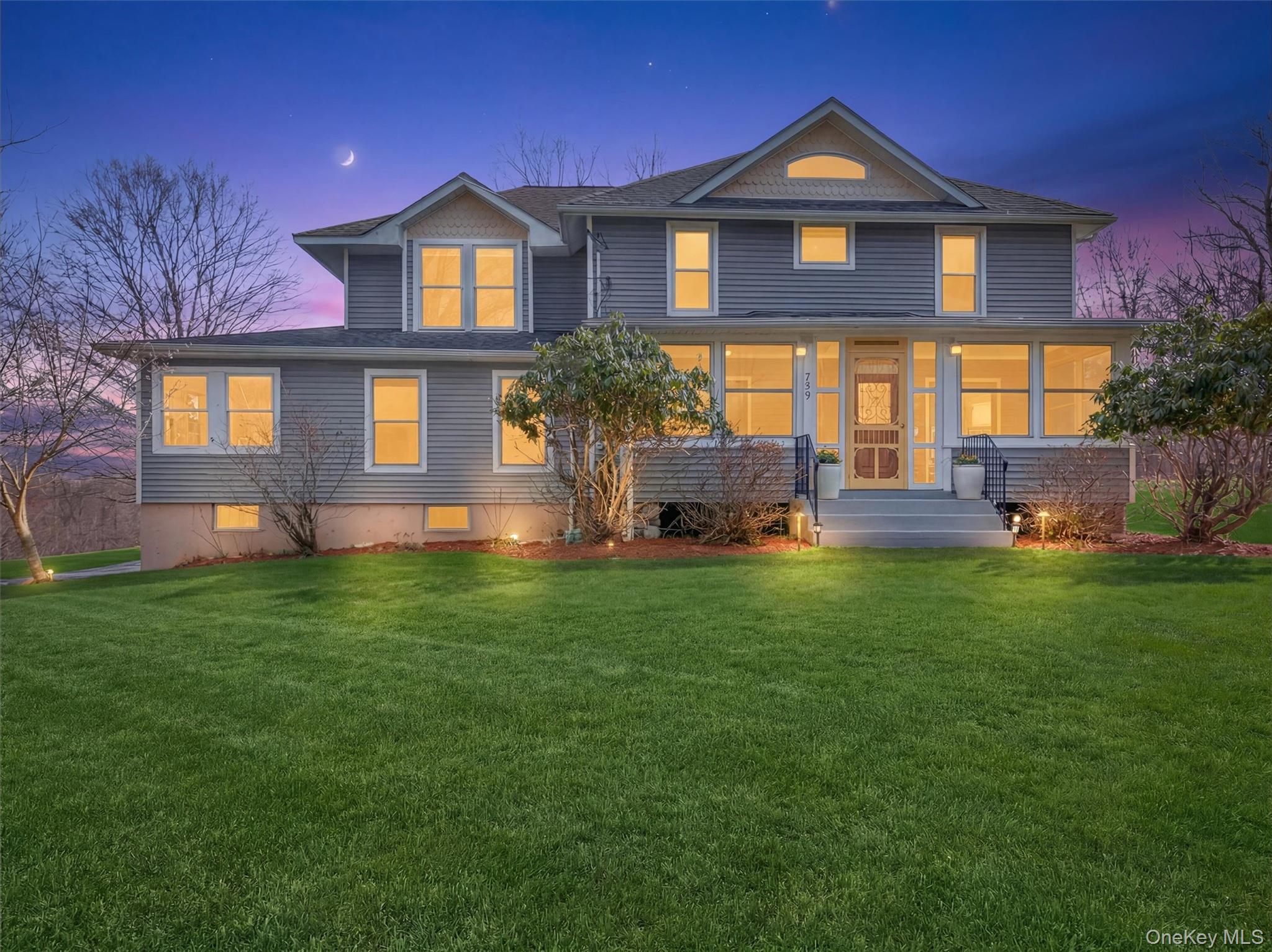 729 Mullock Road Port Jervis, NY 12771 - Photo 3 of 50 a front view of a house with a yard