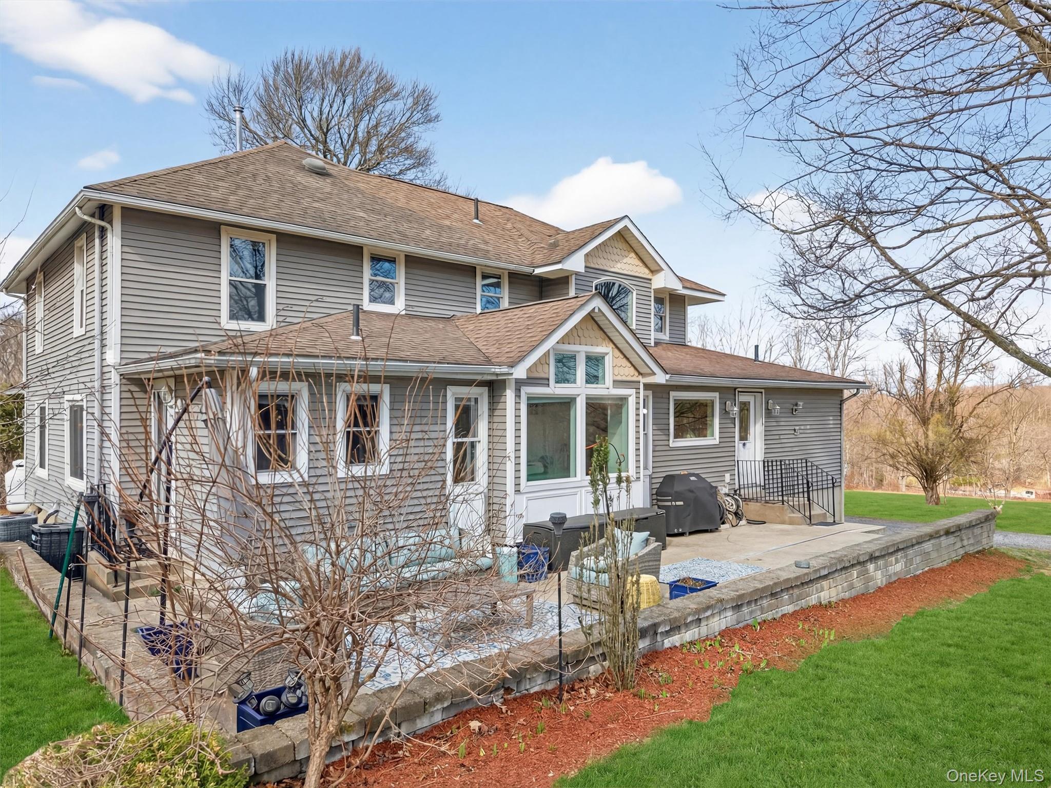 729 Mullock Road Port Jervis, NY 12771 - Photo 40 of 50 a front view of a house with garden