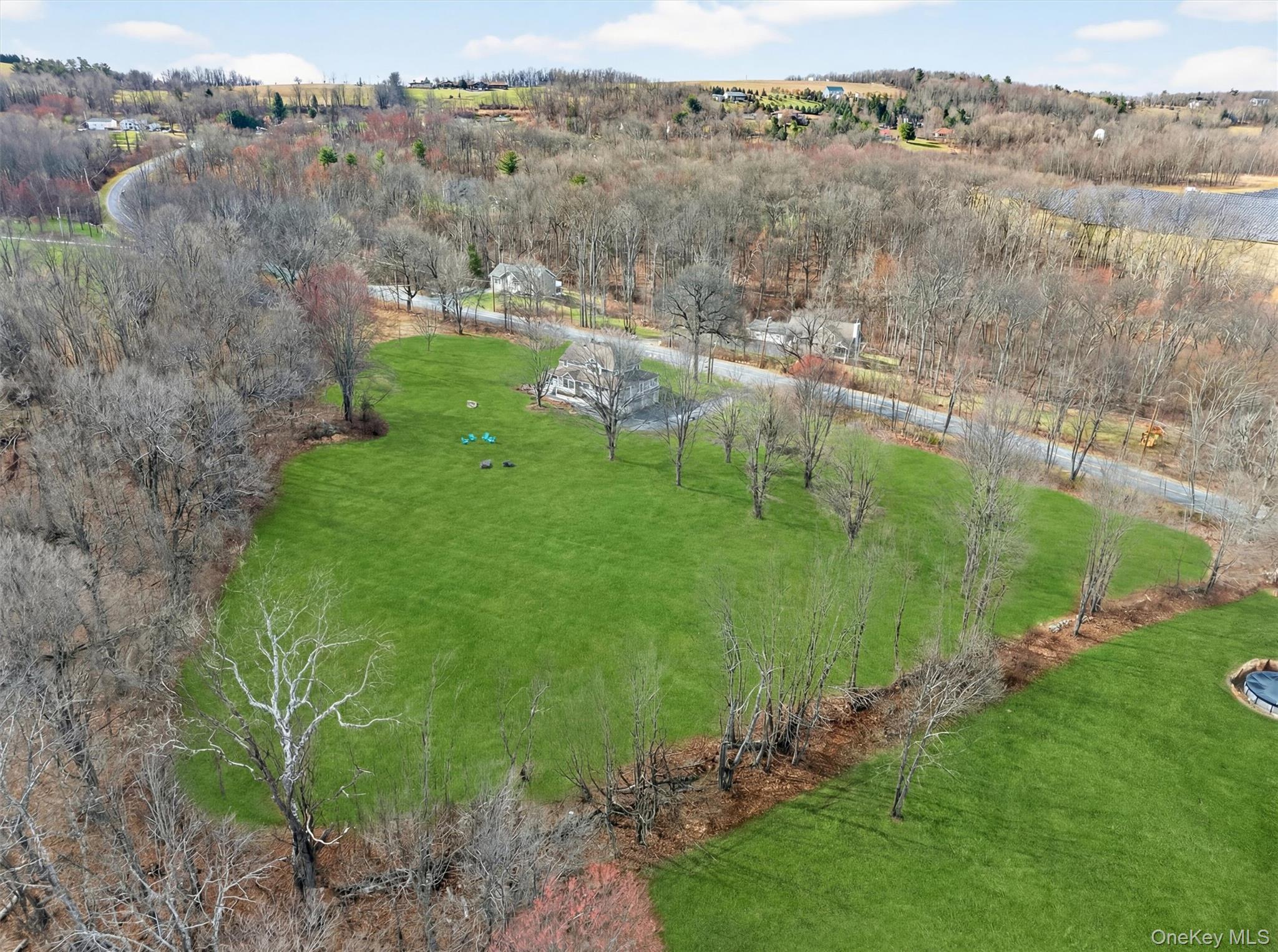 729 Mullock Road Port Jervis, NY 12771 - Photo 42 of 50 a view of a lake with a yard