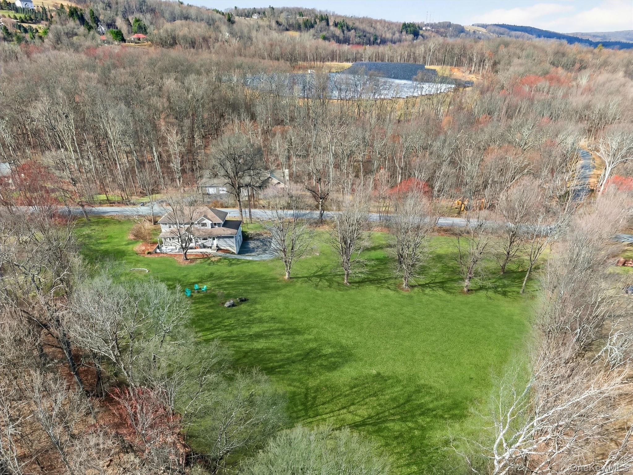 729 Mullock Road Port Jervis, NY 12771 - Photo 43 of 50 a view of a lake with houses