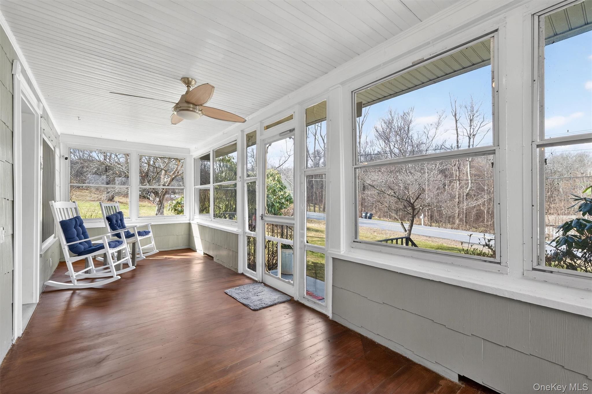 729 Mullock Road Port Jervis, NY 12771 - Photo 8 of 50 a view of a dining room with furniture window and wooden floor