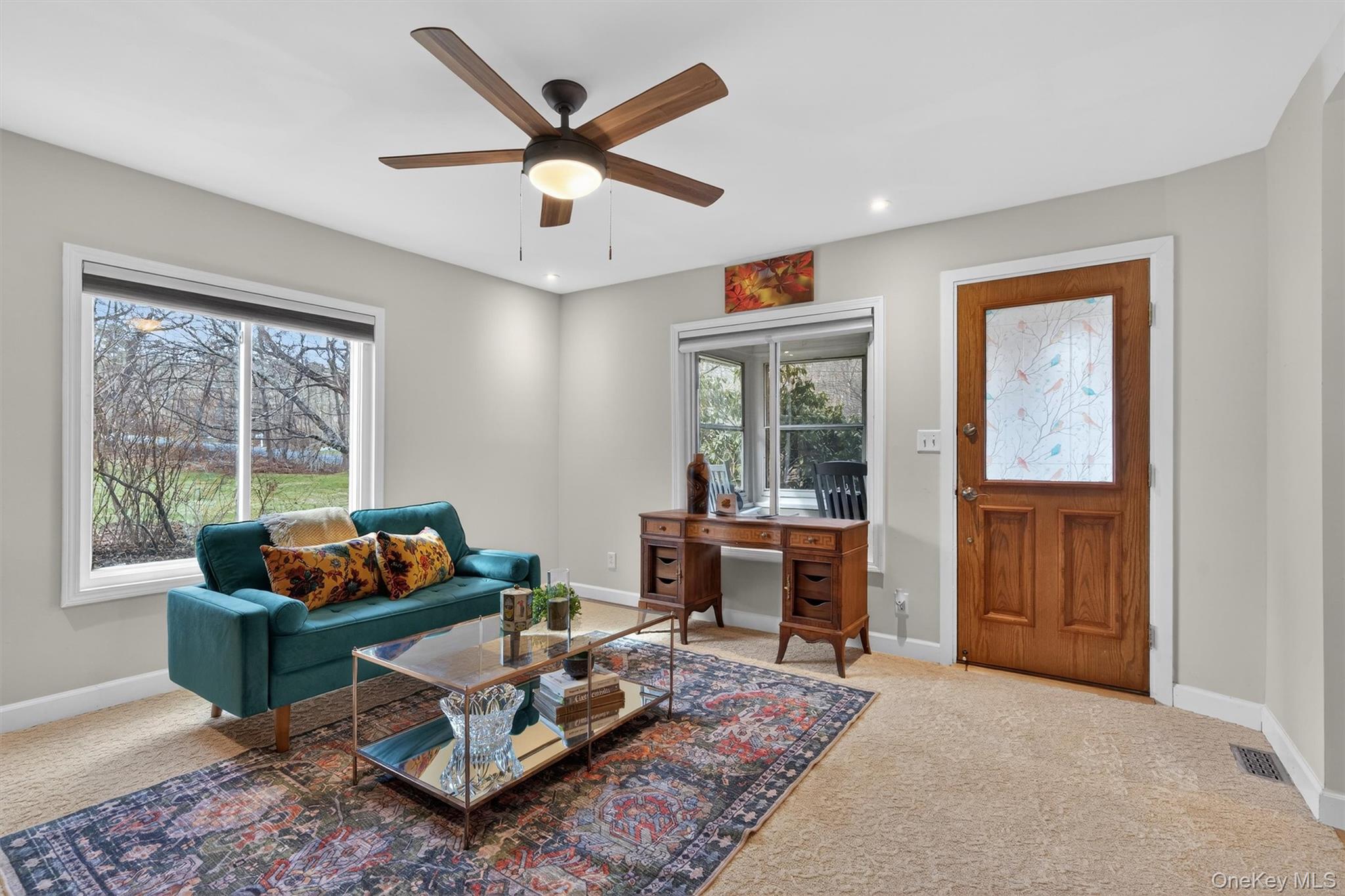 729 Mullock Road Port Jervis, NY 12771 - Photo 9 of 50 a living room with furniture and a large window