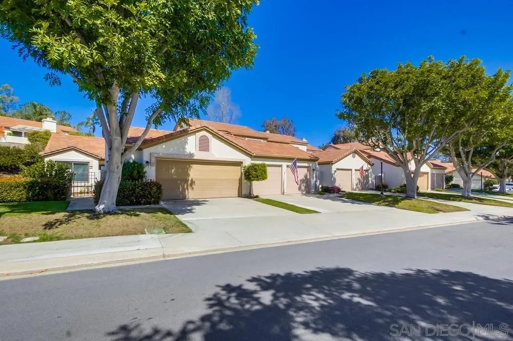 3797 Fallon Circle San Diego, CA 92130 - Photo 3 of 37 a front view of house with yard and trees