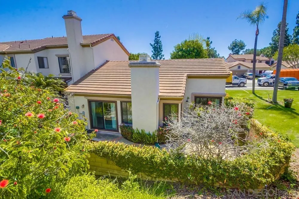 3797 Fallon Circle San Diego, CA 92130 - Photo 32 of 37 a front view of a house with garden