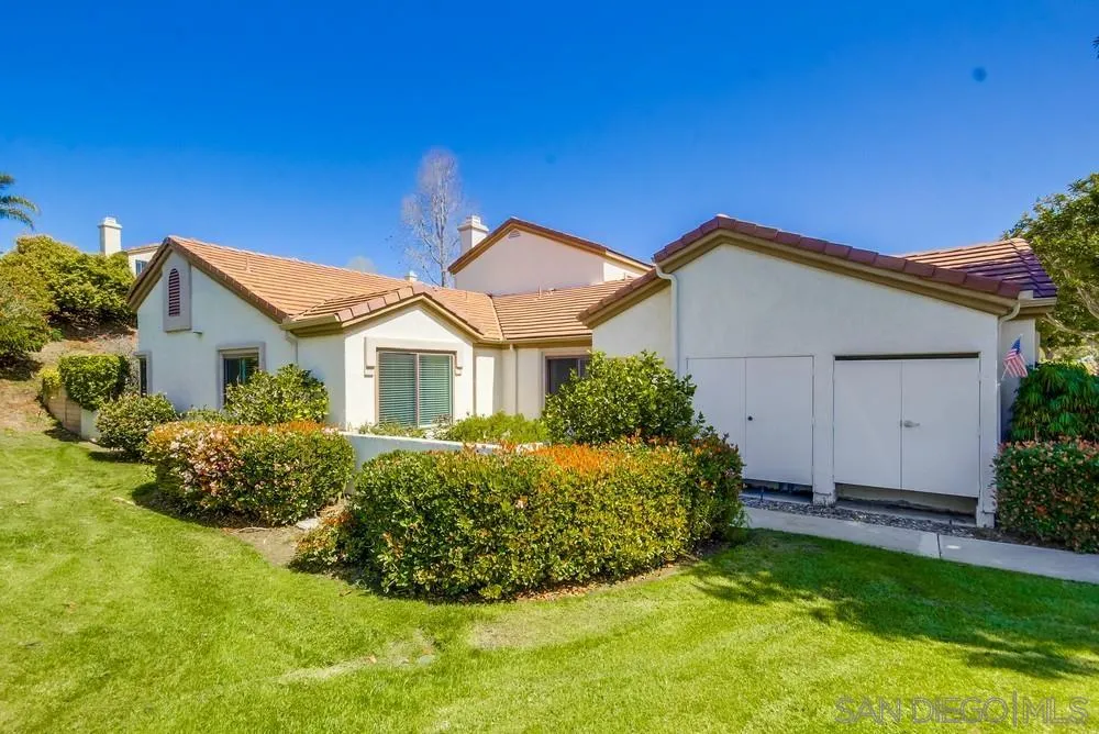 3797 Fallon Circle San Diego, CA 92130 - Photo 33 of 37 a view of a house with a yard and potted plants