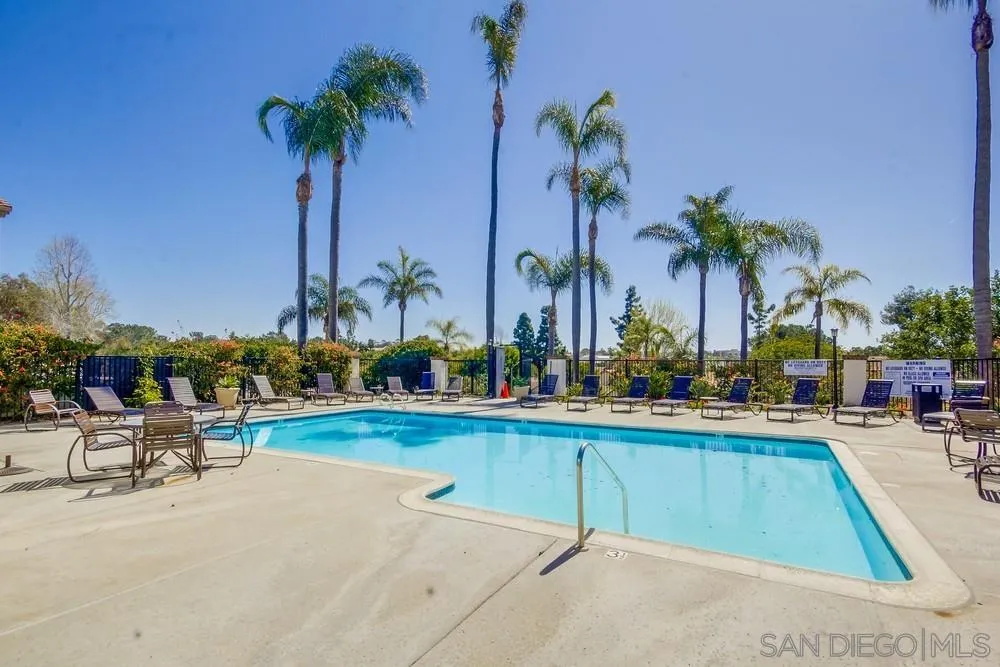3797 Fallon Circle San Diego, CA 92130 - Photo 36 of 37 a view of swimming pool with outdoor seating and a potted plant