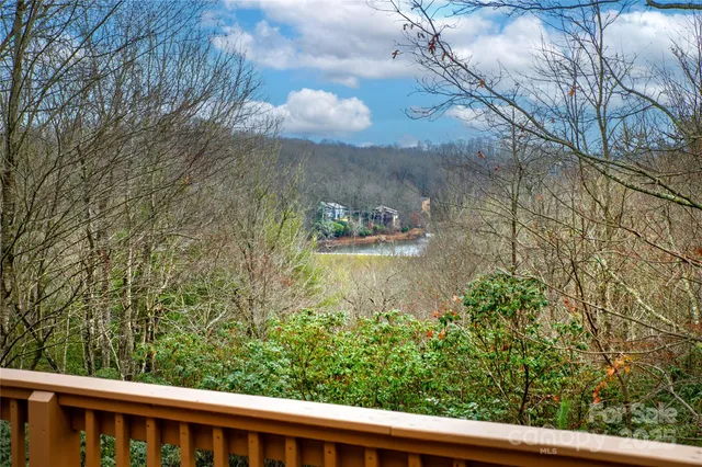 a view of a lake from a balcony