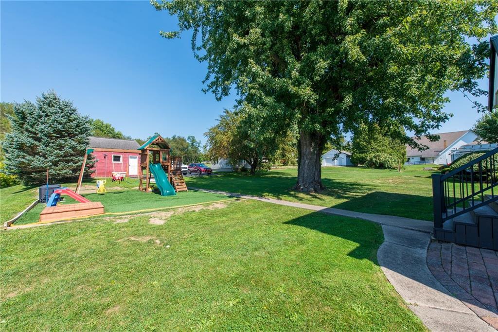 811 Main Street East Rural Valley, PA 16249 - Photo 12 of 49 a view of play ground with large trees