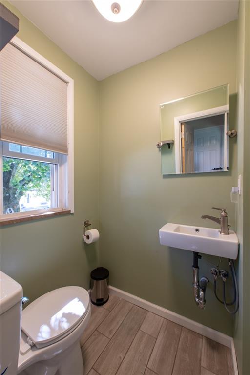 811 Main Street East Rural Valley, PA 16249 - Photo 28 of 49 a bathroom with a sink a toilet and a mirror