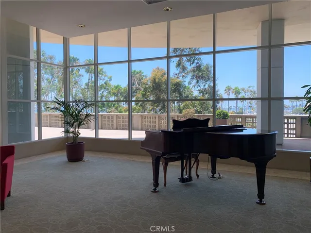 a view of a dining room with furniture and window