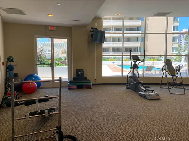 a view of a room with gym equipment
