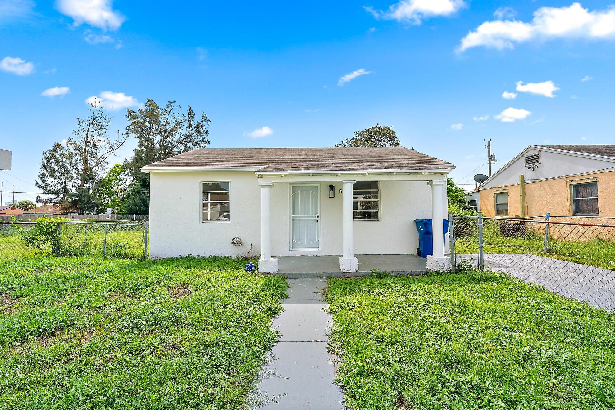 579 West 4th Street Riviera Beach, FL 33404 - Photo 1 of 13 Front of Home
