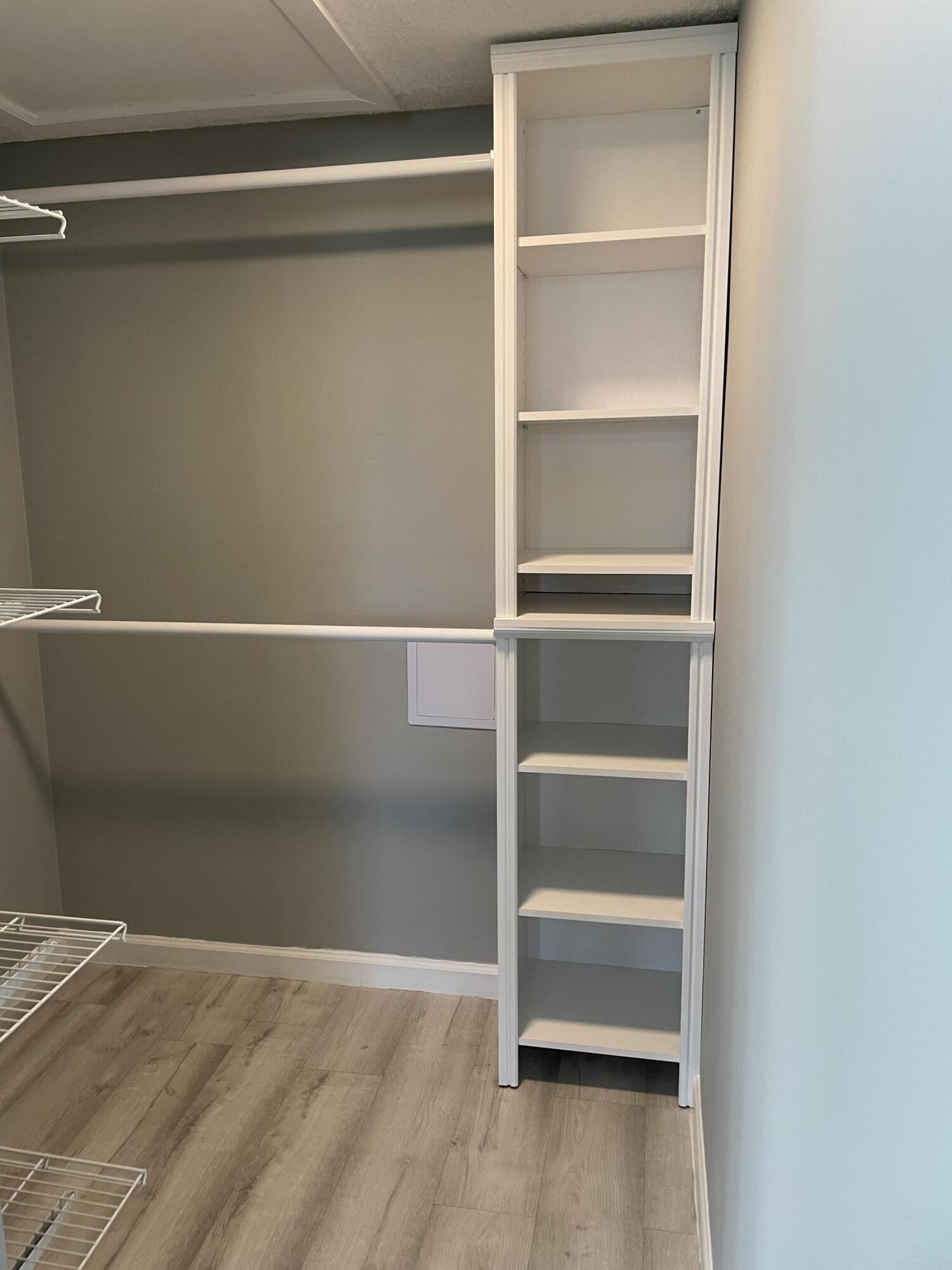 2800 Palmwood Terrace, Unit P221 Boca Raton, FL 33431 - Photo 11 of 16 a view of an empty walk in closet