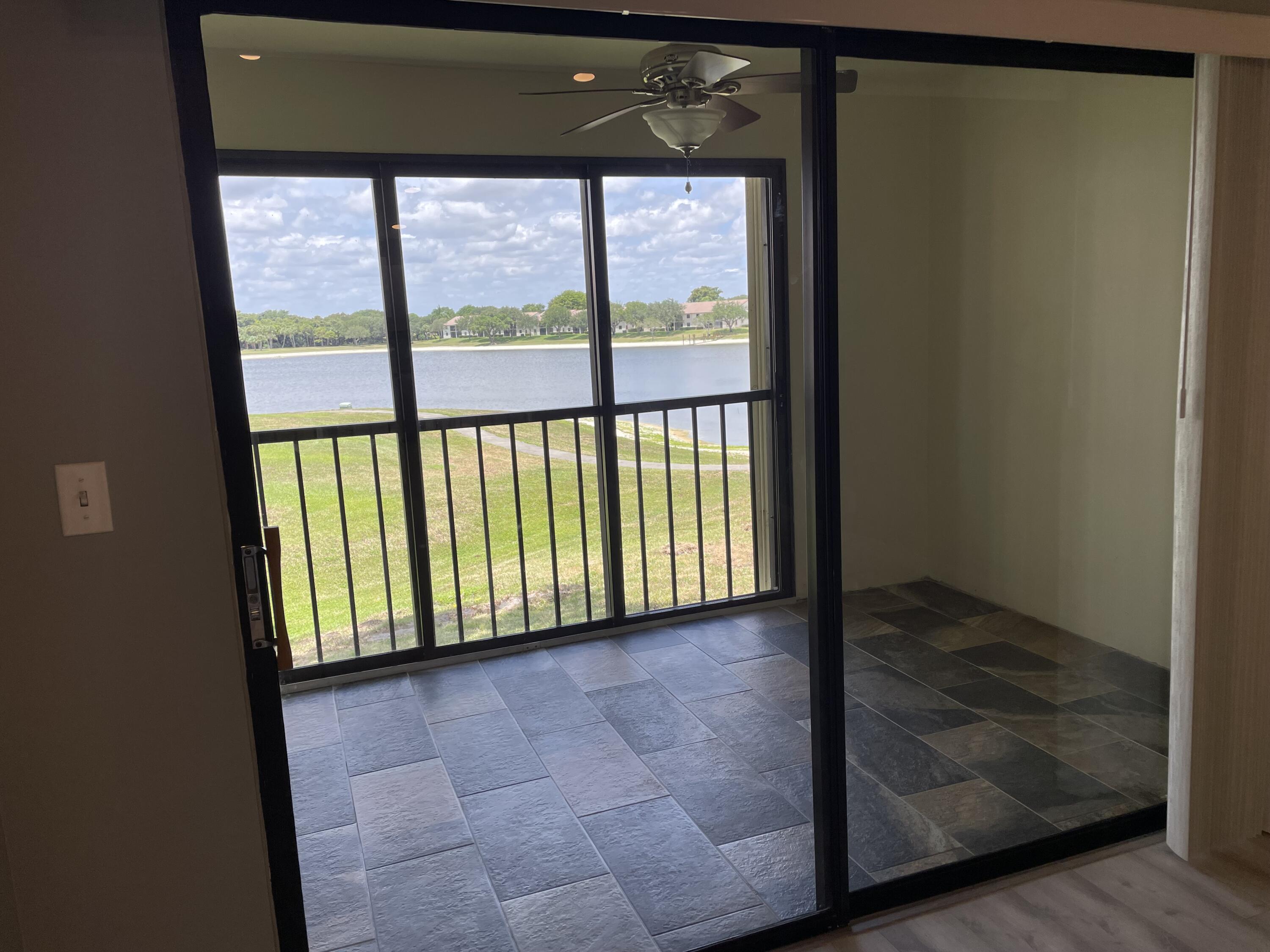 2800 Palmwood Terrace, Unit P221 Boca Raton, FL 33431 - Photo 7 of 16 a view of an empty room with a window