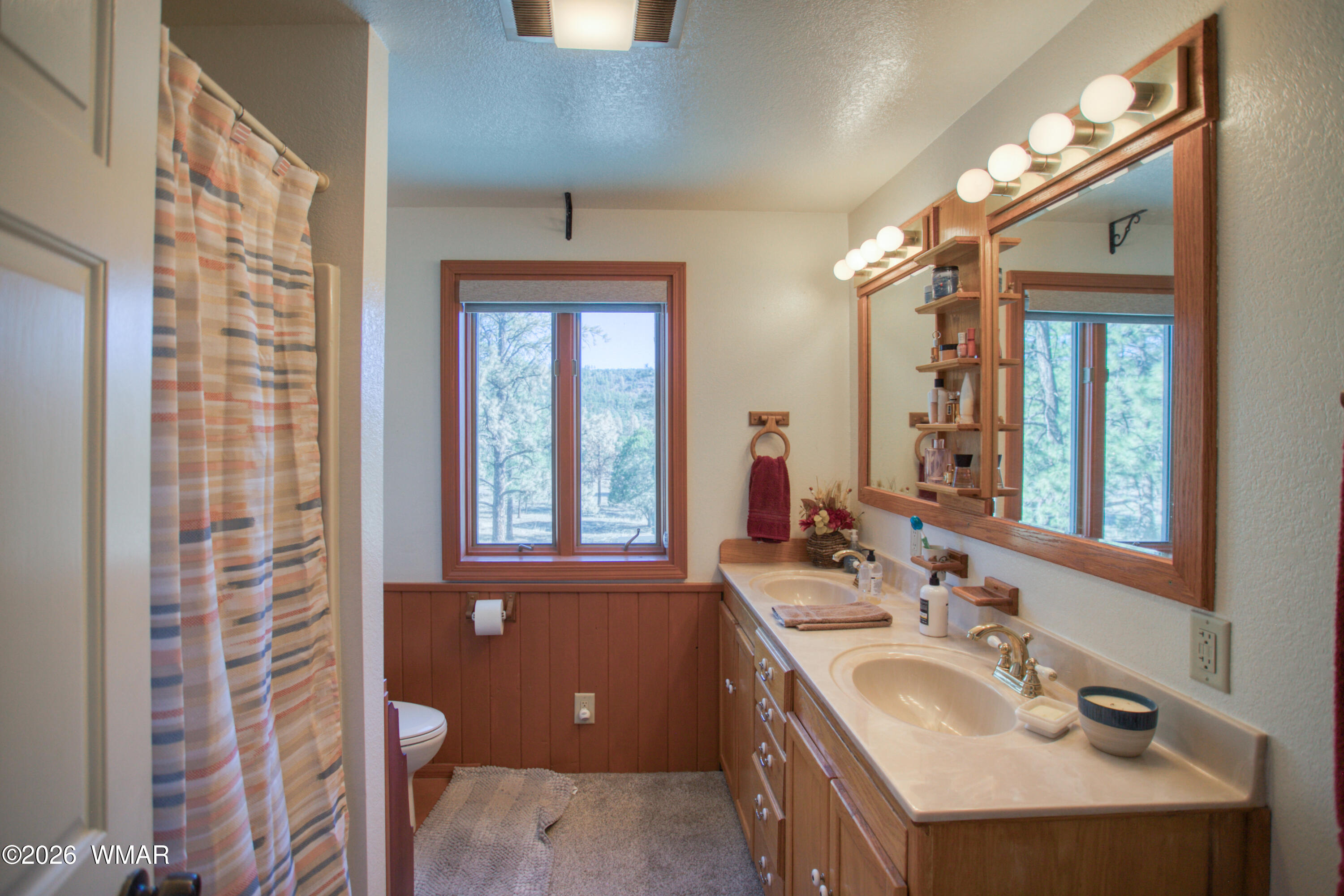 19 County Road Show Low, AZ 85901 - Photo 14 of 43 a bathroom with a sink double vanity and a mirror