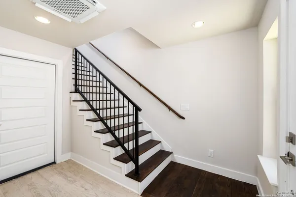 a view of entryway with wooden floor