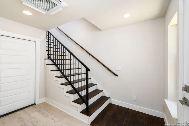 a view of entryway with wooden floor