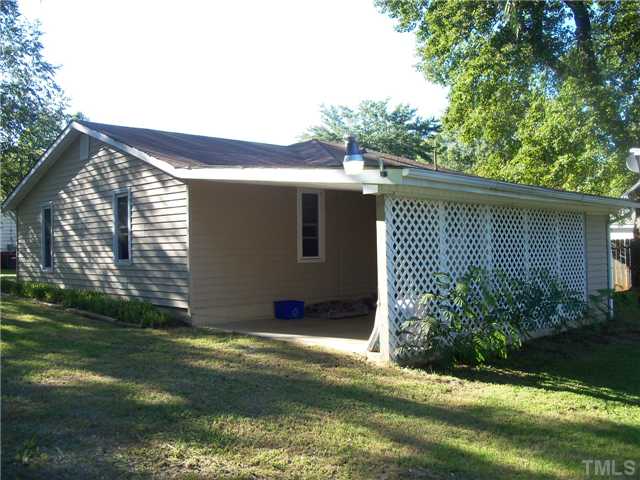 1234 Pointer Street Roxboro, NC 27573 - Photo 15 of 17 Rear view. Lattice on carport provides privacy