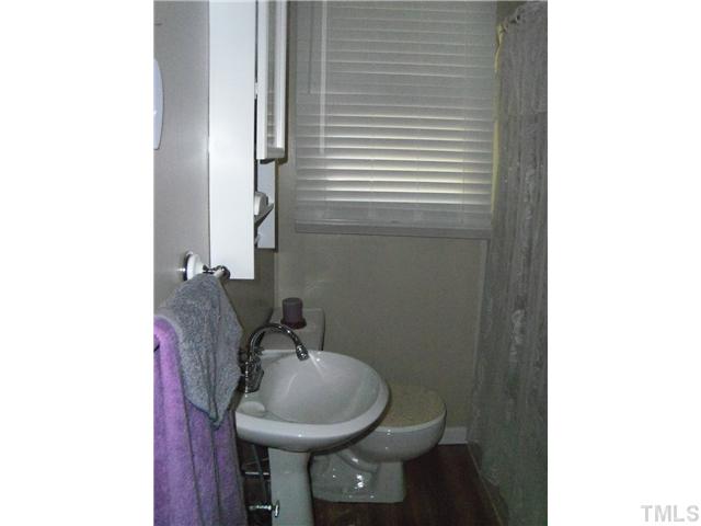 1234 Pointer Street Roxboro, NC 27573 - Photo 10 of 17 Bathroom located in hallway has been upgraded too.