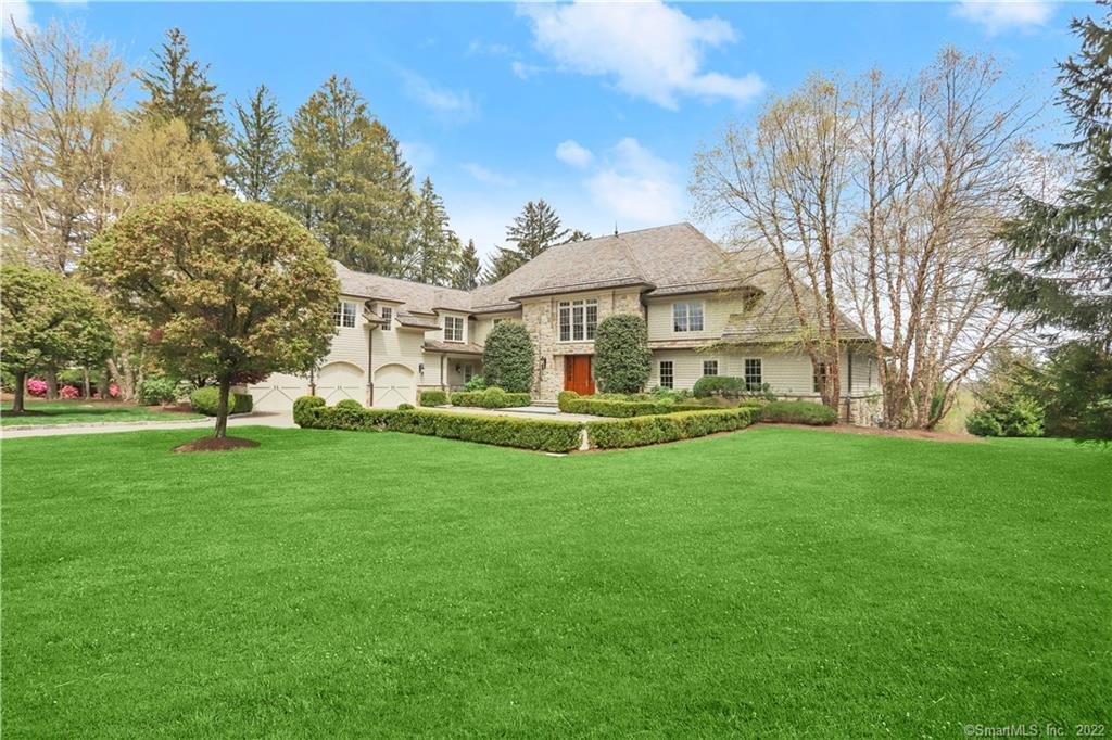 6 Chieftans Road Greenwich, CT 06831 - Photo 1 of 1 a view of a house with a big yard