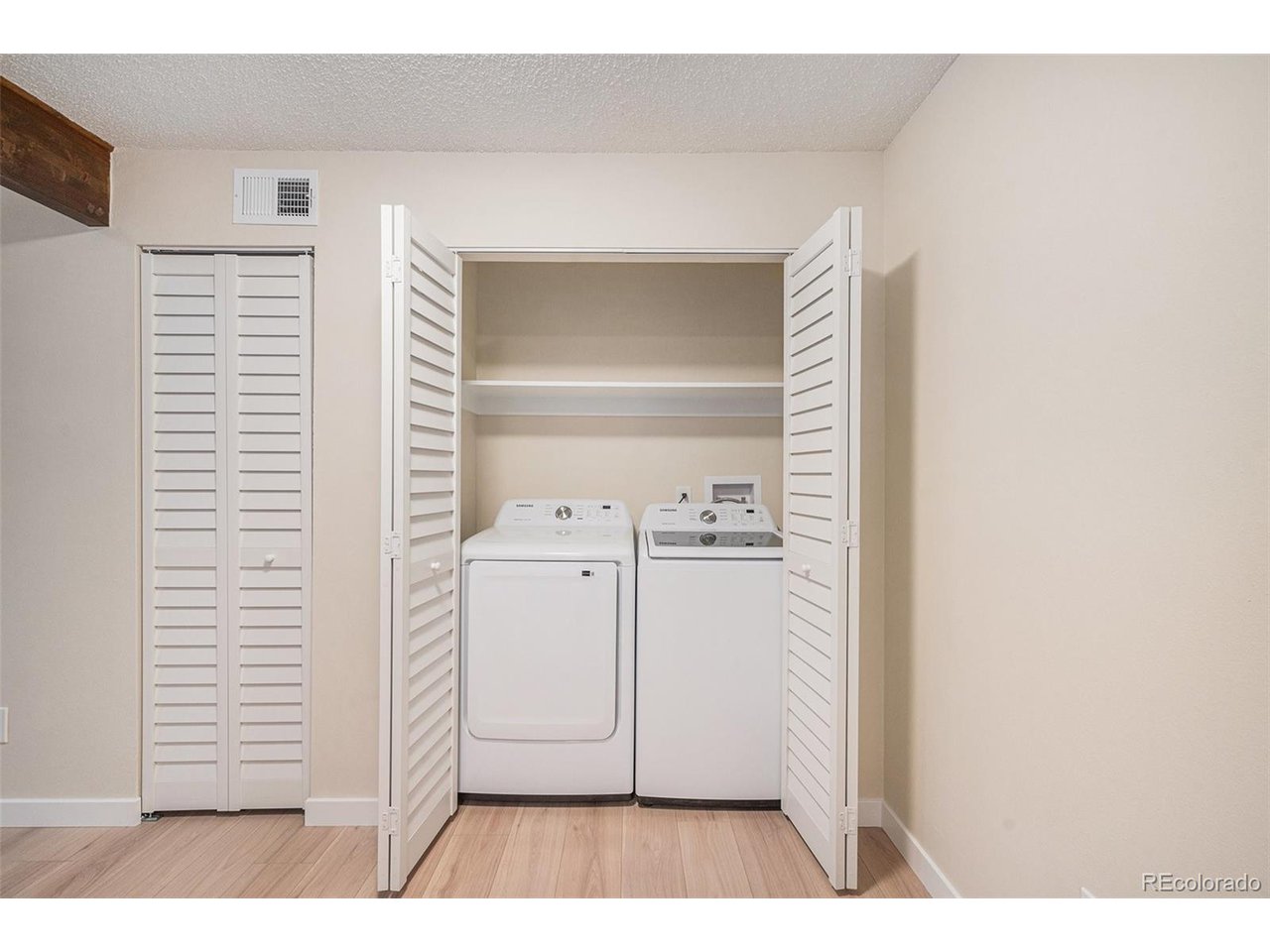 10251 West 44th Avenue, Unit 204 Wheat Ridge, CO 80033 - Photo 9 of 13 a view of storage and utility room