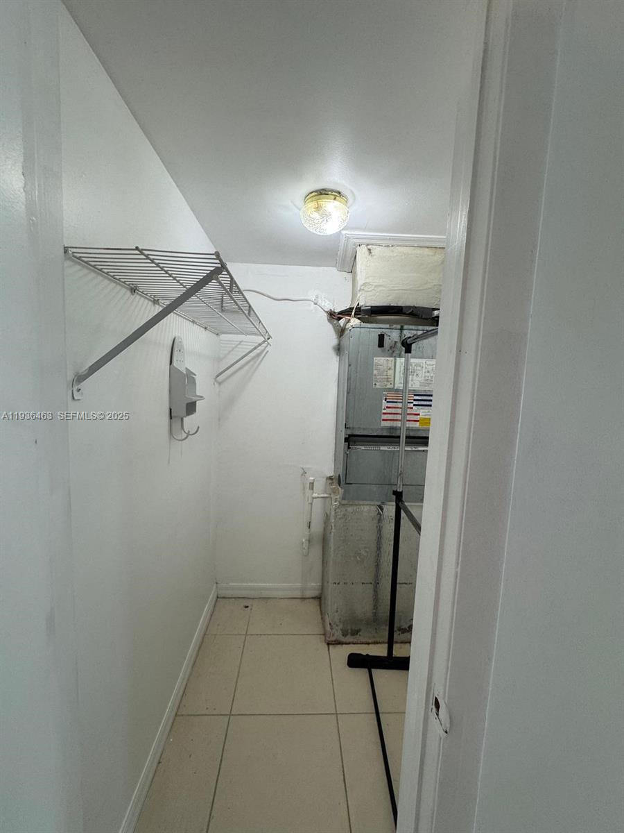680 Northeast 88th Terrace, Unit 11 Miami, FL 33138 - Photo 7 of 8 a view of storage and utility room