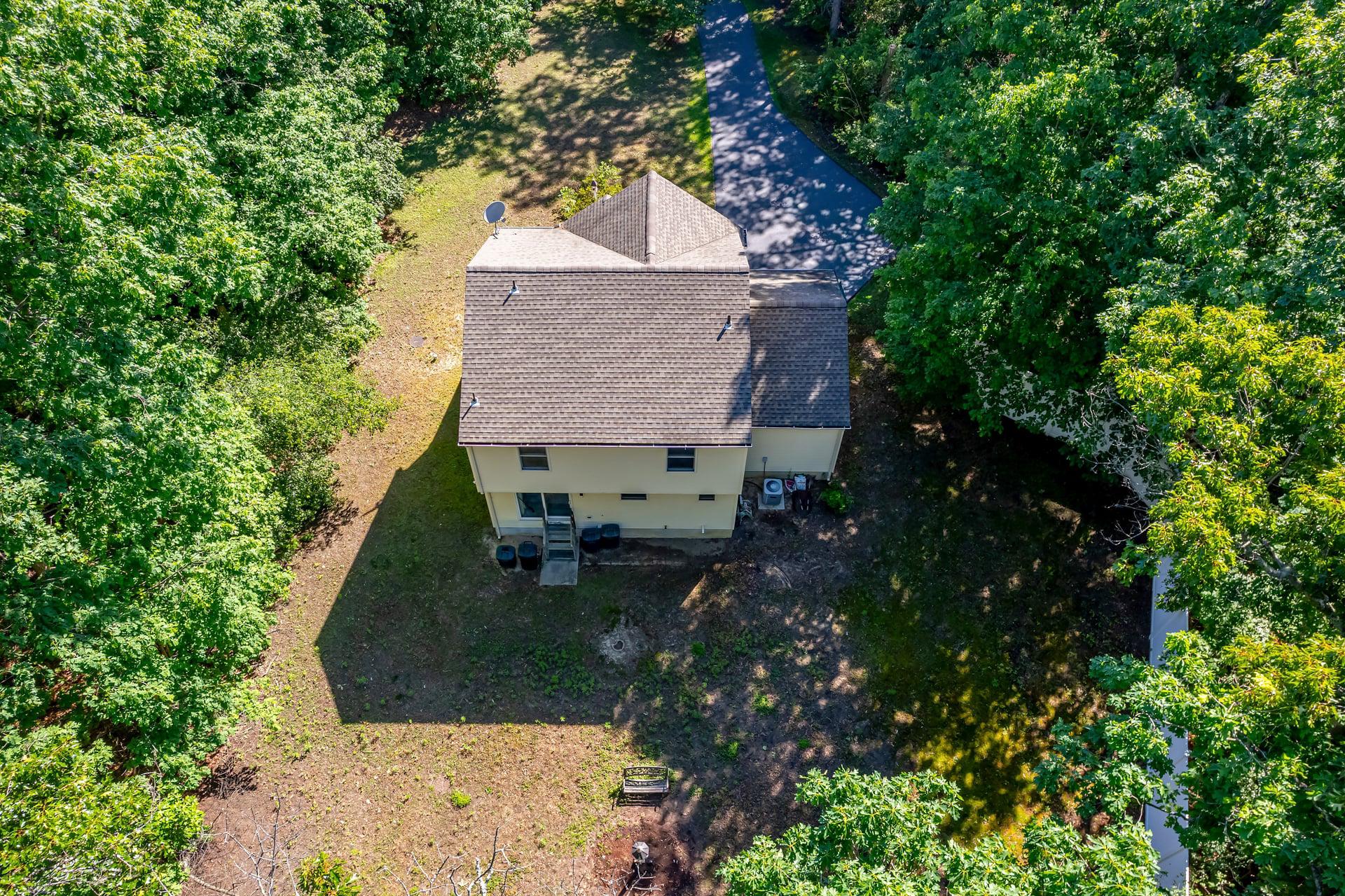 164 Clarks Pond Road Bridgeton, NJ 08302 - Photo 10 of 27 Serene home nestled in lush greenery.