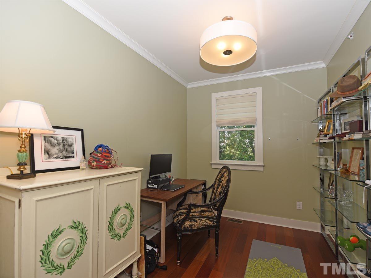 520 John Haywood Way, Unit 102 Raleigh, NC 27604 - Photo 10 of 18 a workspace with furniture and window