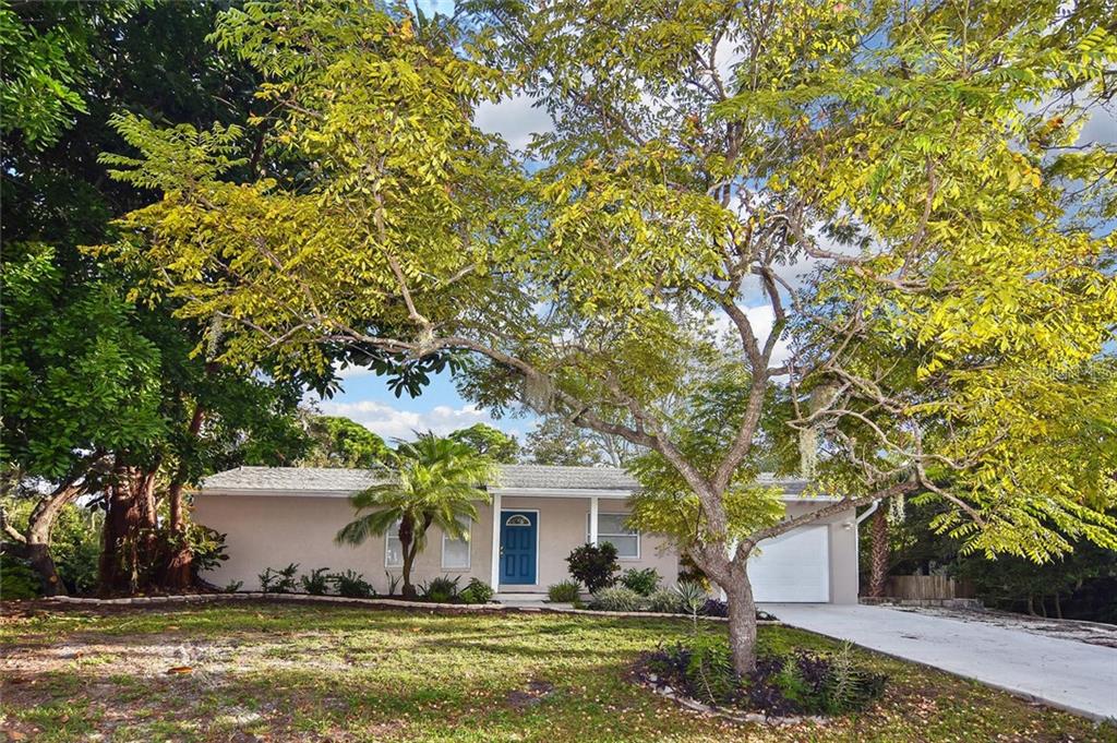 5681 Hale Road Venice, FL 34293 - Photo 1 of 1 a view of a house with a yard