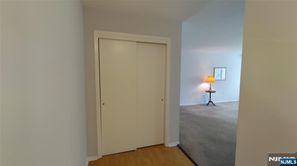 2210 Hilltop Road Mahwah, NJ 07430 - Photo 9 of 14 a view of a room that has a sink and a chair in it