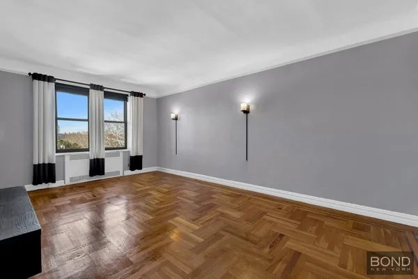 a view of big room with windows