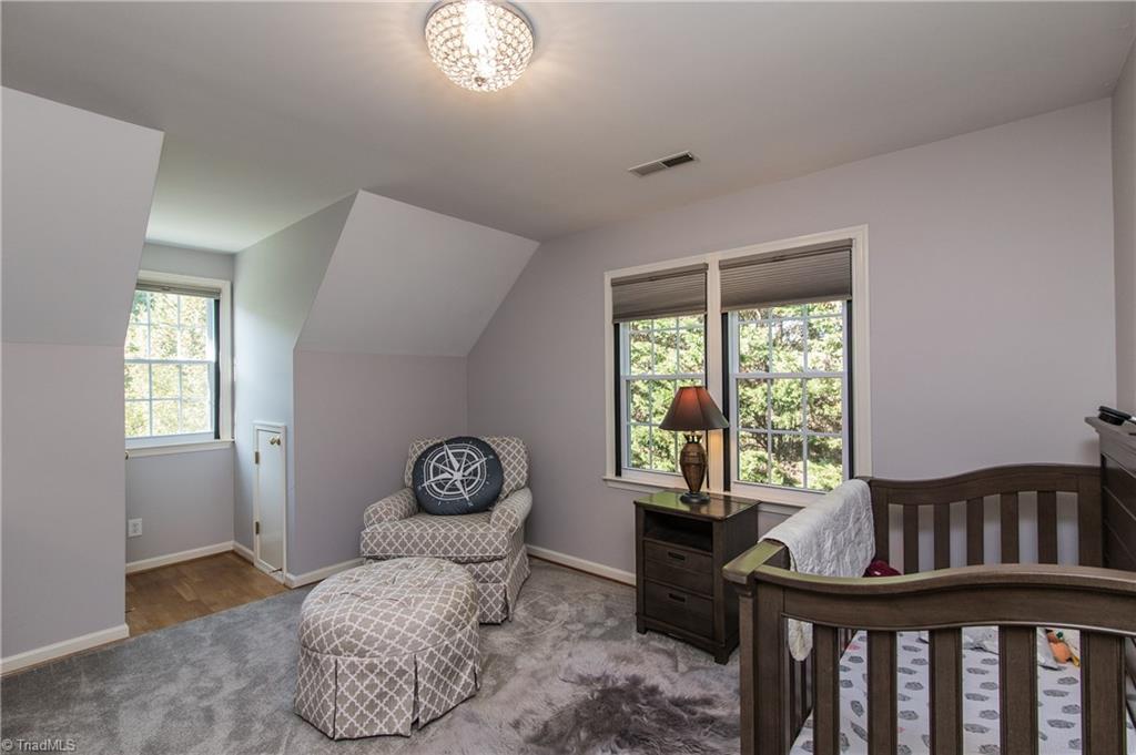 1443 Talbot Road Pleasant Garden, NC 27313 - Photo 19 of 29 2nd Bedroom with eave storage