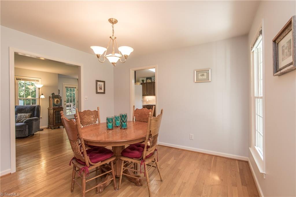 1443 Talbot Road Pleasant Garden, NC 27313 - Photo 5 of 29 Dining room leading to living room and kitchen